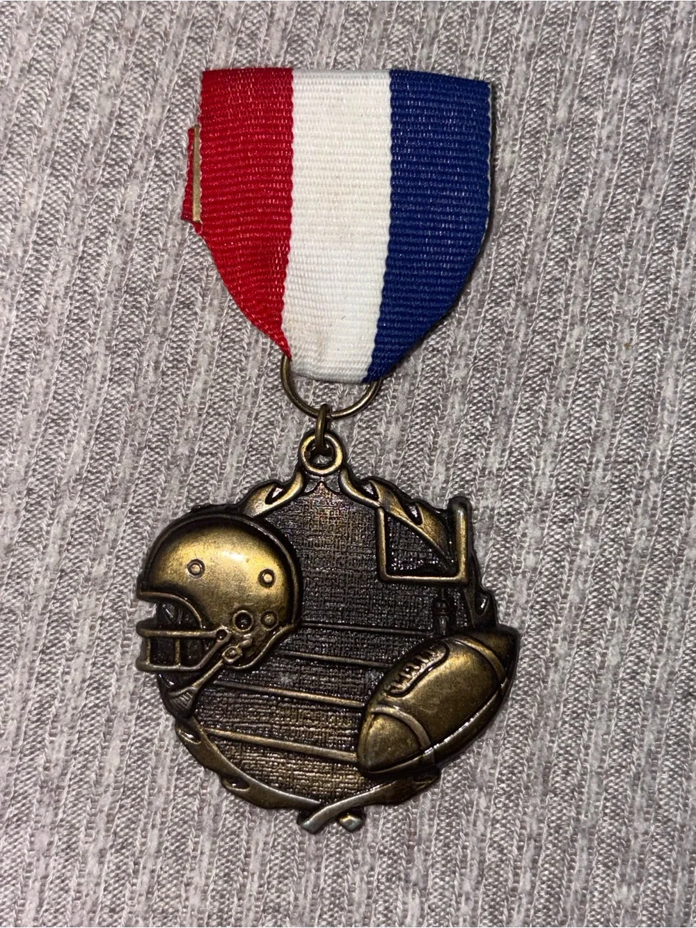 PDU marked bronze tone round football & helmet medal brooch w multicolor ribbon